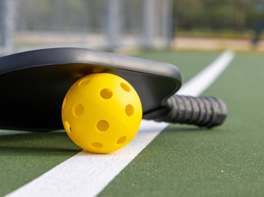 pickleball ball and paddle fault line