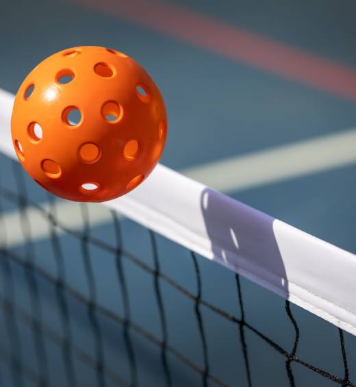 What is a pickleball made of